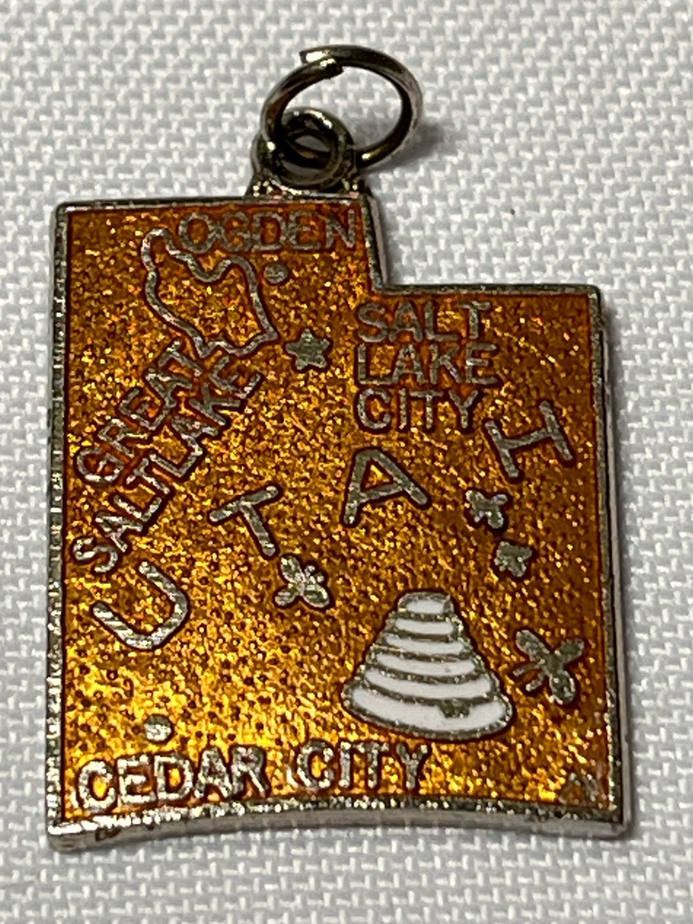 Vintage Utah State Charm Bracelet Pendant - Orange and Silver
Collect